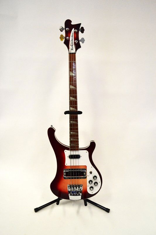 Rickenbacker Electric Guitar: 2006 Rickenbacker 4003 bass, serial #07155, Fireglo finish, comes with ghs strings, case, and accessories. Good condition.