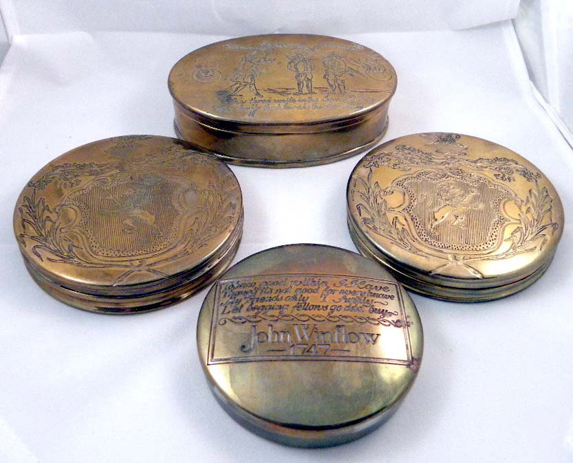 Four Round Brass Snuff Boxes: All with engravings and figures. Largest: 4"