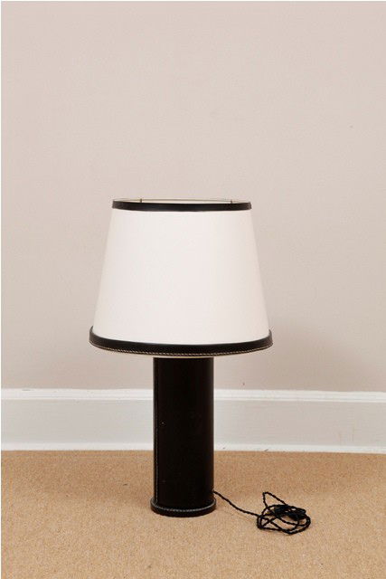 Jacques Adnet Black Leather Lamp: Having a white upholstered shade with black leather trim. Good condition. 6" Dia x 16" column x 27" H