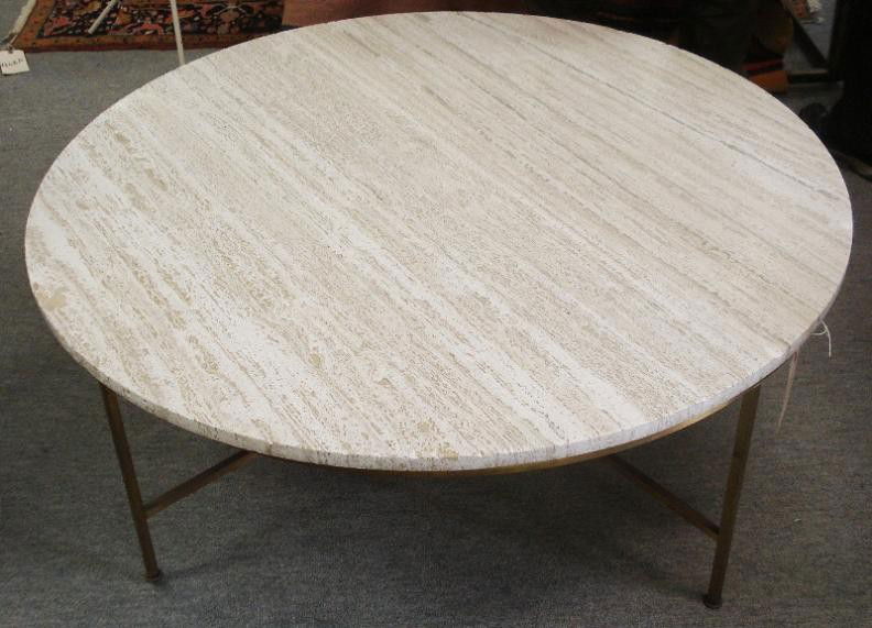 Modern Cocktail Table: Round brass table having a travertine top. Good condition. 42" dia x 14.5" H.