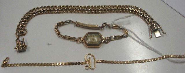 Ladies 14K Art Deco Watch: With 10K bracelet, together with two gold chains. 14K yellow gold. Two chains, 7 DWT. Watch not weighted.