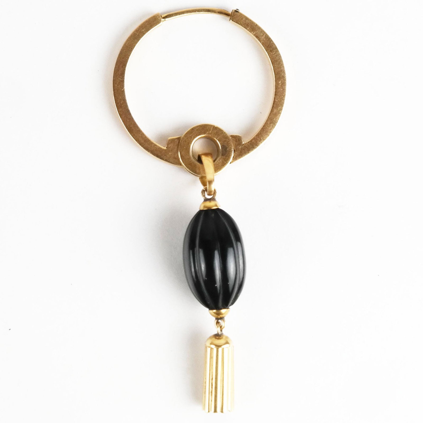 14K Yellow Gold Hoop Tassel Pendant: 14k yellow gold hoop tassel pendant with black oval stone, stamped 585. 9.2 grams including stone. [2 3/4" L x 1 1/8" W].