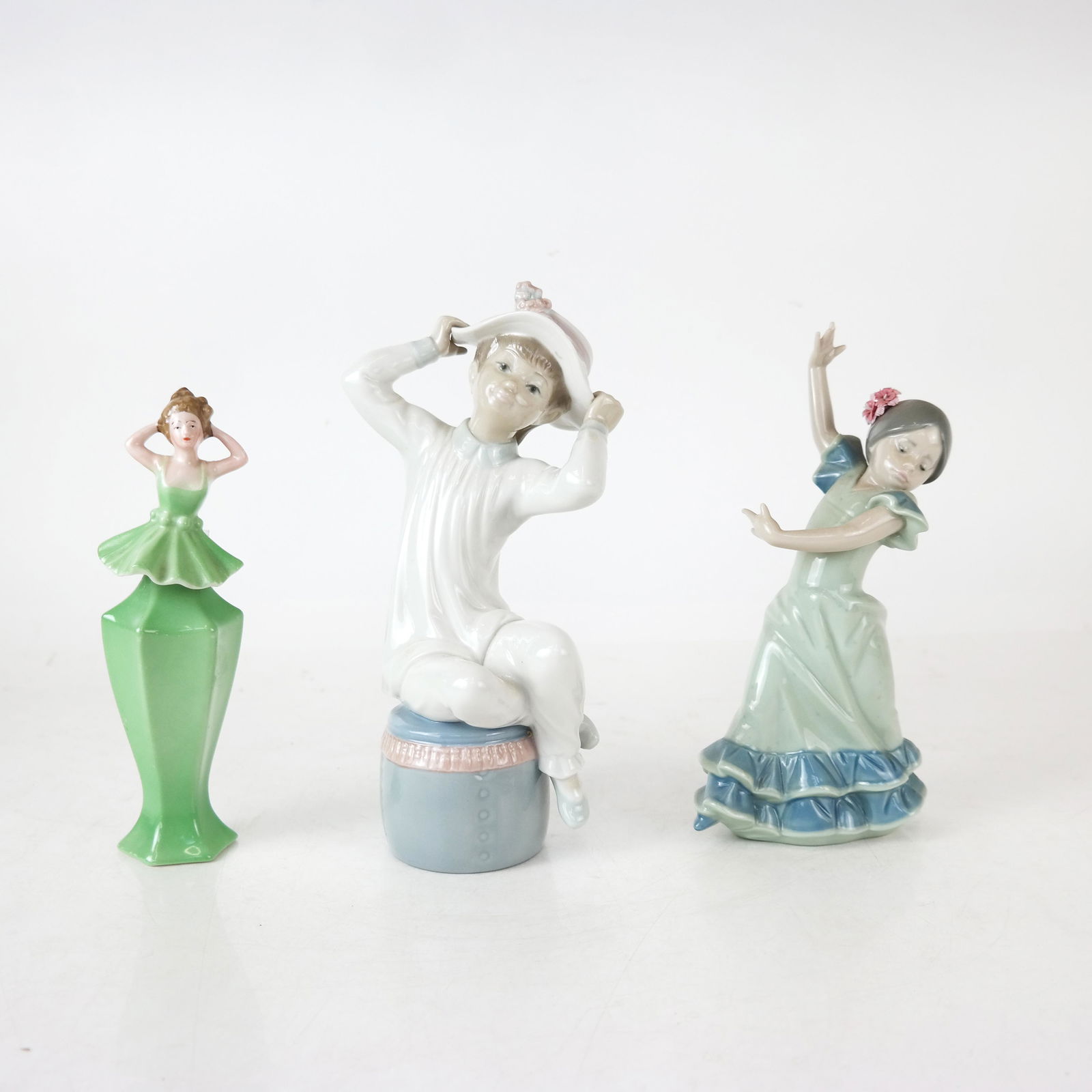 Three Porcelain Female Figures (1 of 13)