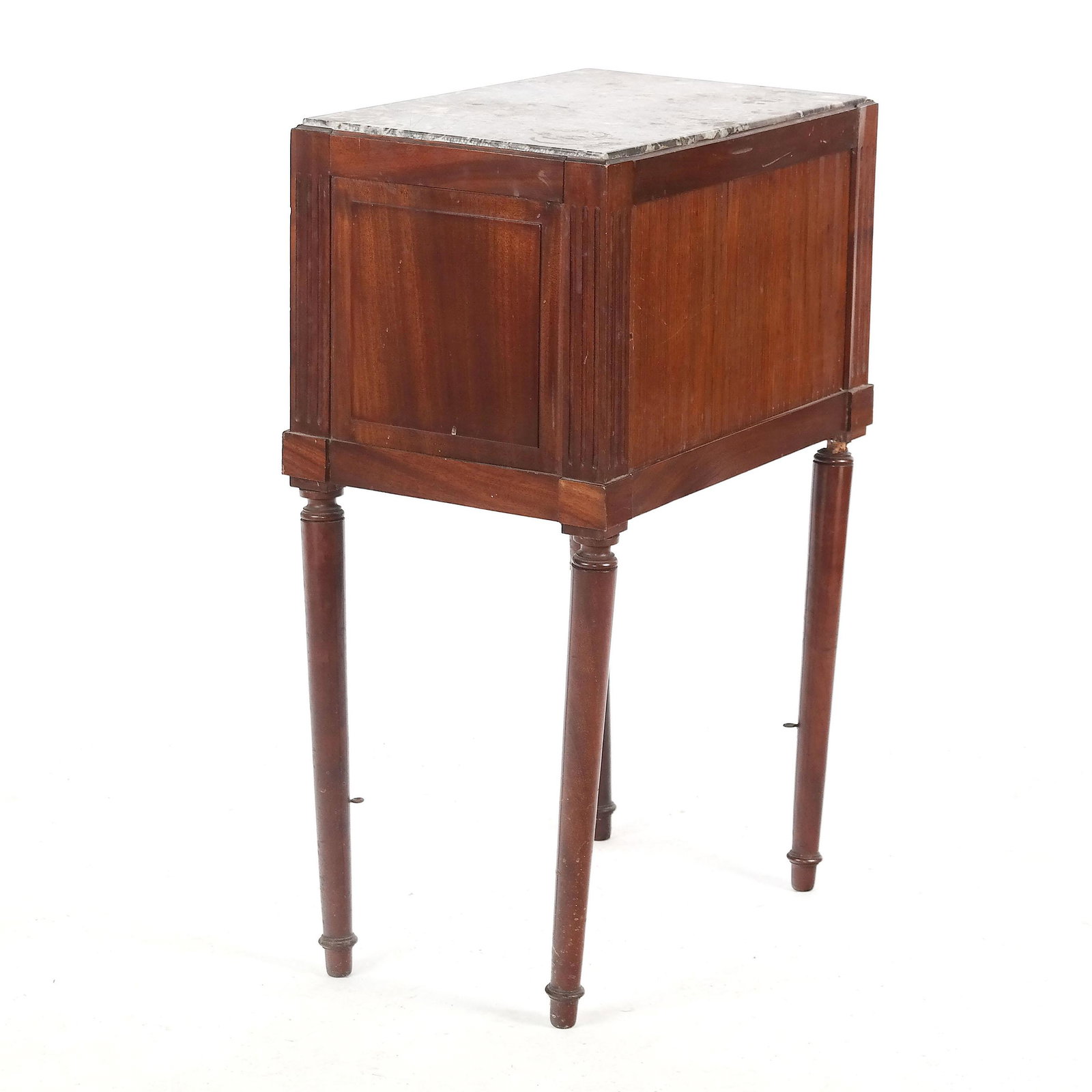 Small Mahogany Tambour Night Stand: 20th century small mahogany tambour night stand with marble top. [20" H x 18" W x 12" D]. Missing tambour door knob; one leg re-attached.
