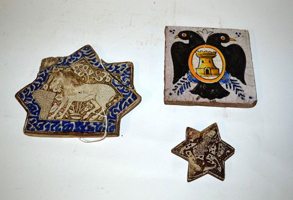 Two Antique Hispano-Moresque Tiles w/ Other: Two antique Hispano-Moresque tin glazed majolica tiles. Each star form tile features an equestrian motif (one with a Persian rider). Accompanied by a later square Spanish tile with a double-headed bir