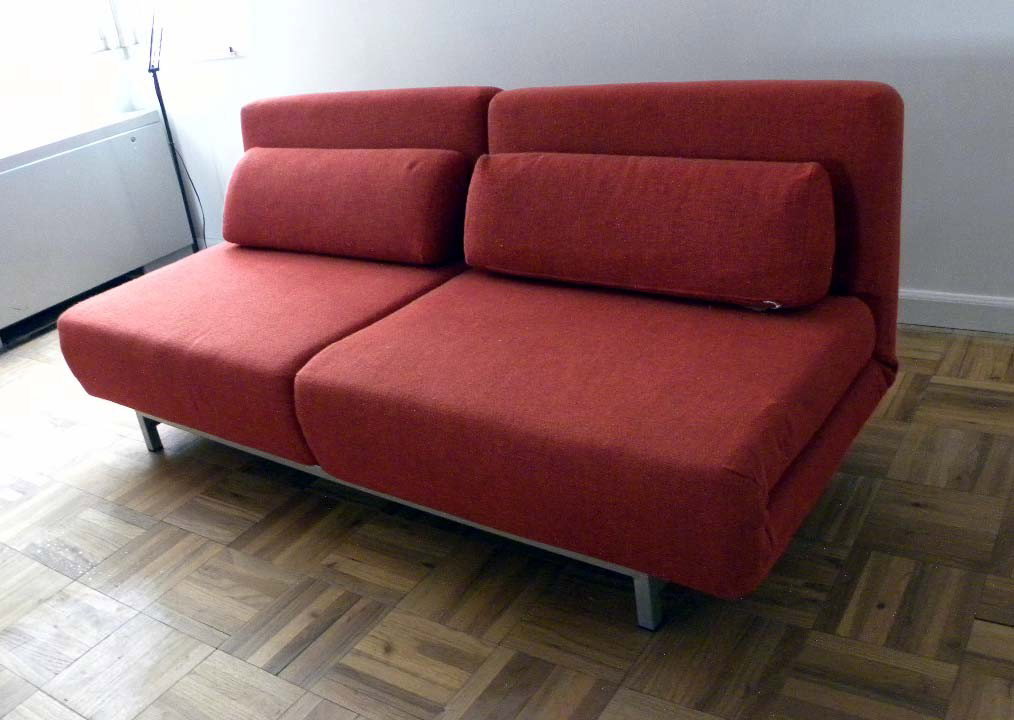 Knoll Bed: Red upholstered two part bed by Knoll. 77" x 36" x 10" each.