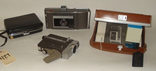 Two Cameras in Cases: A Polaroid Electric Eue Land camera in case together wish a Nikon Nikkonex-Zoon 8 video camera in case. Overall good condition.