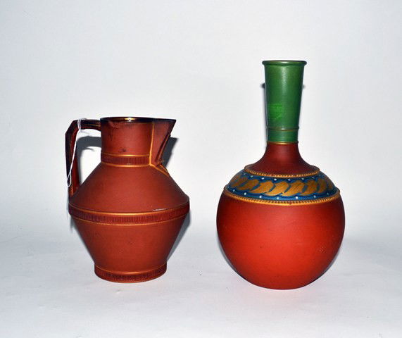 Christopher Dresser, Two Vases, England: A ceramic ewer, together with a decorated vase by Christopher Dresser. English. Ewer has chips, vase is in good condition. 9.75" H (largest).