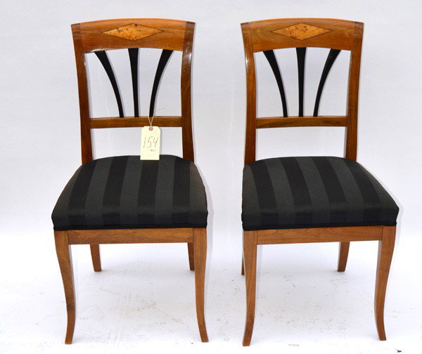 Pair of Biedermeier Side Chairs : Pair of French walnut Biedermeier side chairs, having diamond inlay on crests with striped upholstery. Good condition.