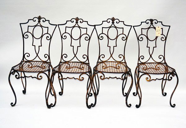Set of Six Jean-Charles Moreaux Dining Chairs: Set of six Jean-Charles Moreaux gilt bronze dining chairs with scrolling cartouche back splats and legs. 17.25" W x 18.25" D x 38.75" H (18" H to seat).