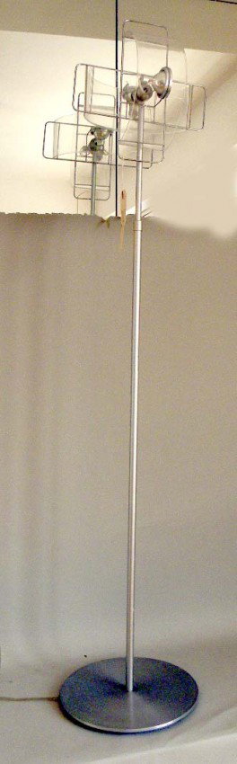 Contemporary Modernist Floor Lamp by Pablo: Contemporary modernist adjustable floor lamp. Bears two independent pivot halogen lights with clear plastic shades, one cracked. 11.25" Dia x 46" to 54.5" H.