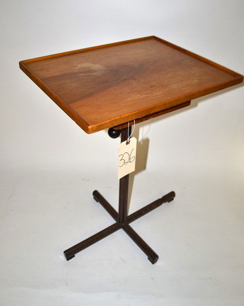 Embru Werkes Tilt-Top Stand: Adjustable two tier center table designed by Francois Caruelle in 1936, having a black painted metal X base. Bears Embru Brevet label. Good condition. 26.5" H x 20.25" L x 16.25" D (top tier).