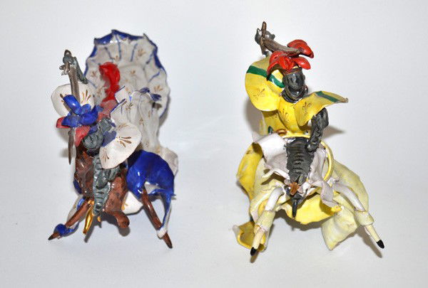 Martini Mid-Century Ceramic Knights on Horseback: Two Martini Mid-Century ceramic knights on horseback with swords drawn and charging forward, both signed "Martini". 7" to 7.5" H. Both in good condition.