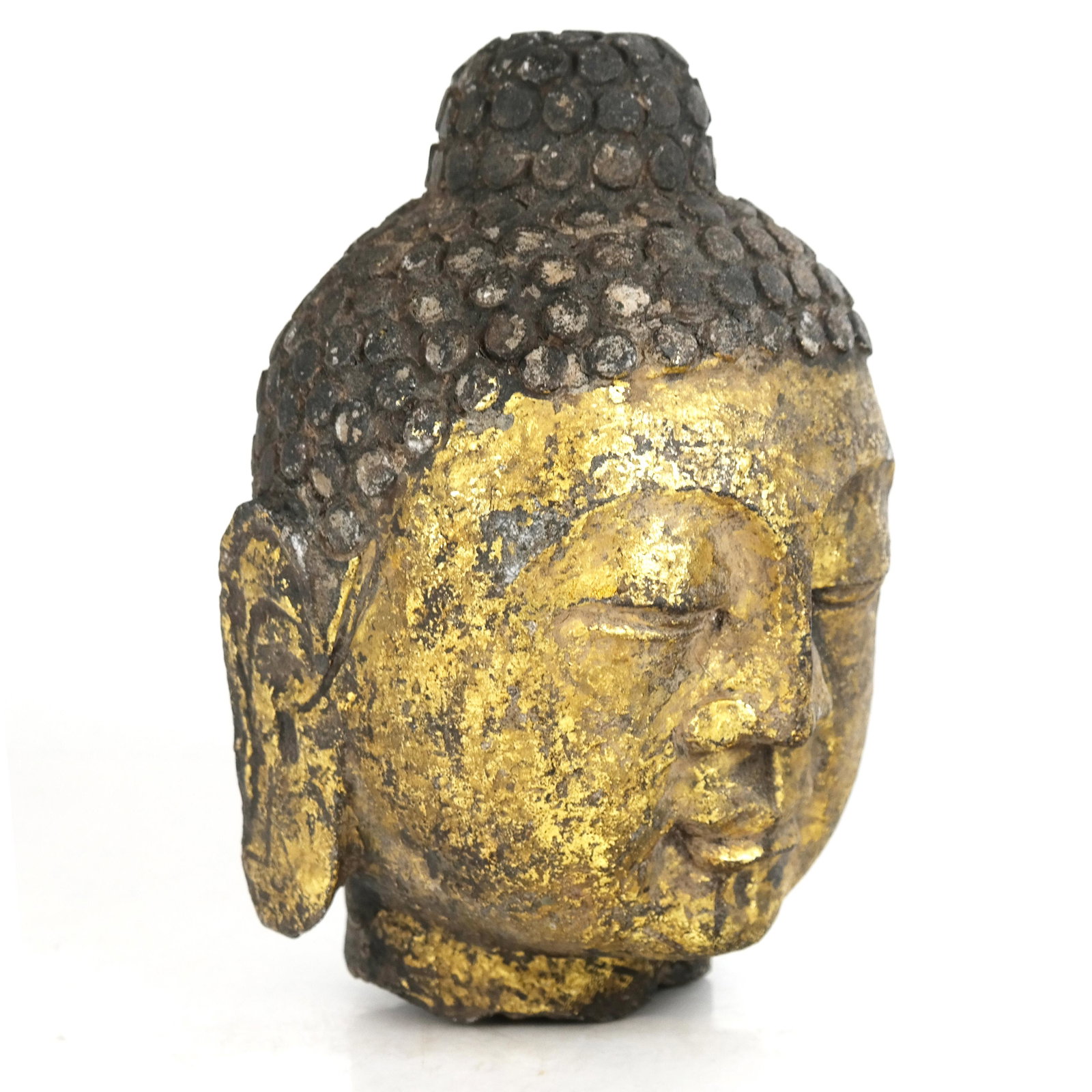 Parcel Gilt Bust of Buddha: Parcel gilt bust of Buddha, modeled with serene countenance. [8 1/2" H x 6 1/2" Diam.]. Wear to decoration, rough edges to neck.