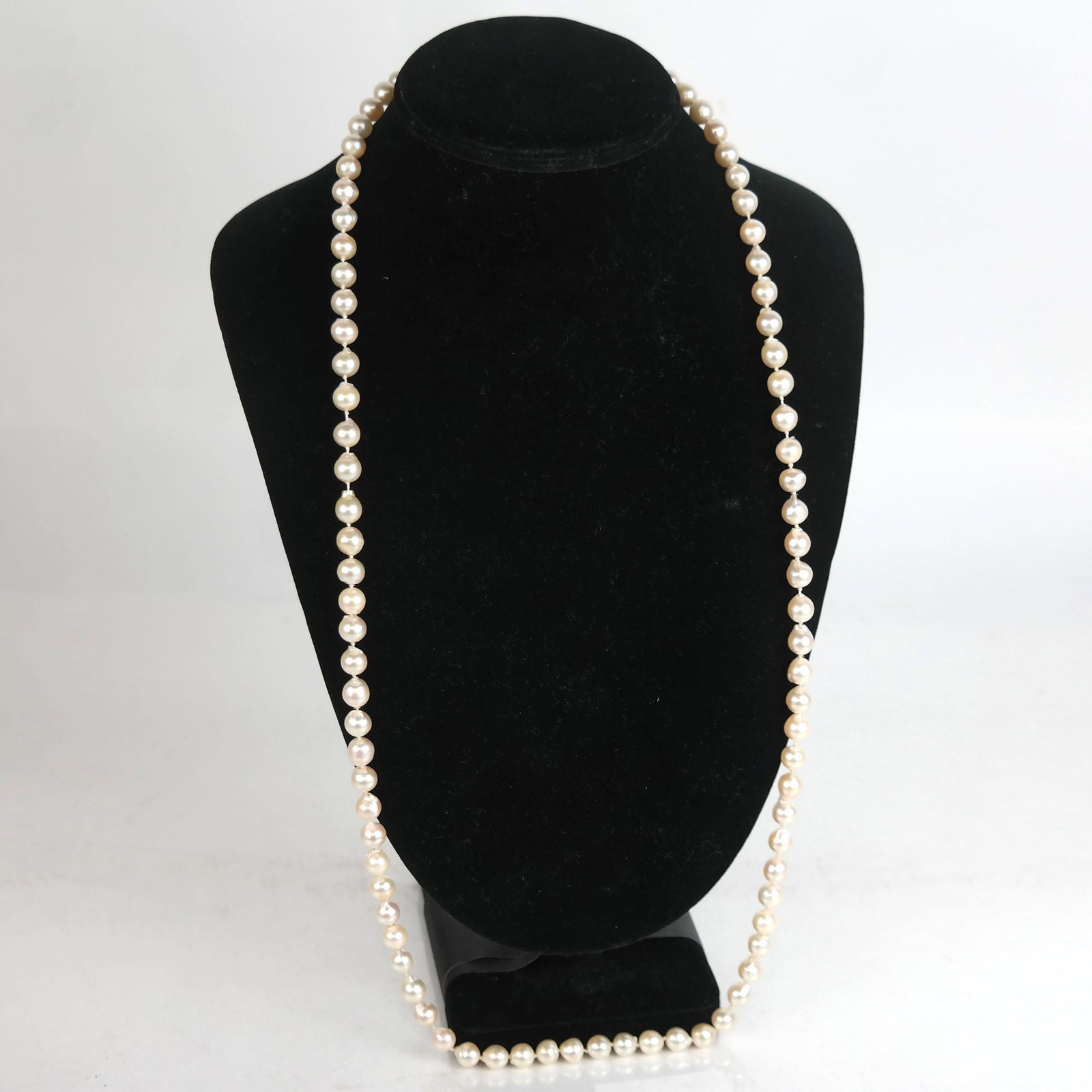 Baroque Cultured Pearl Necklace with 14K Clasp: Baroque cultured pearl necklace with 14k gold clasp. Average 7.5mm size. [32 1/2" L].