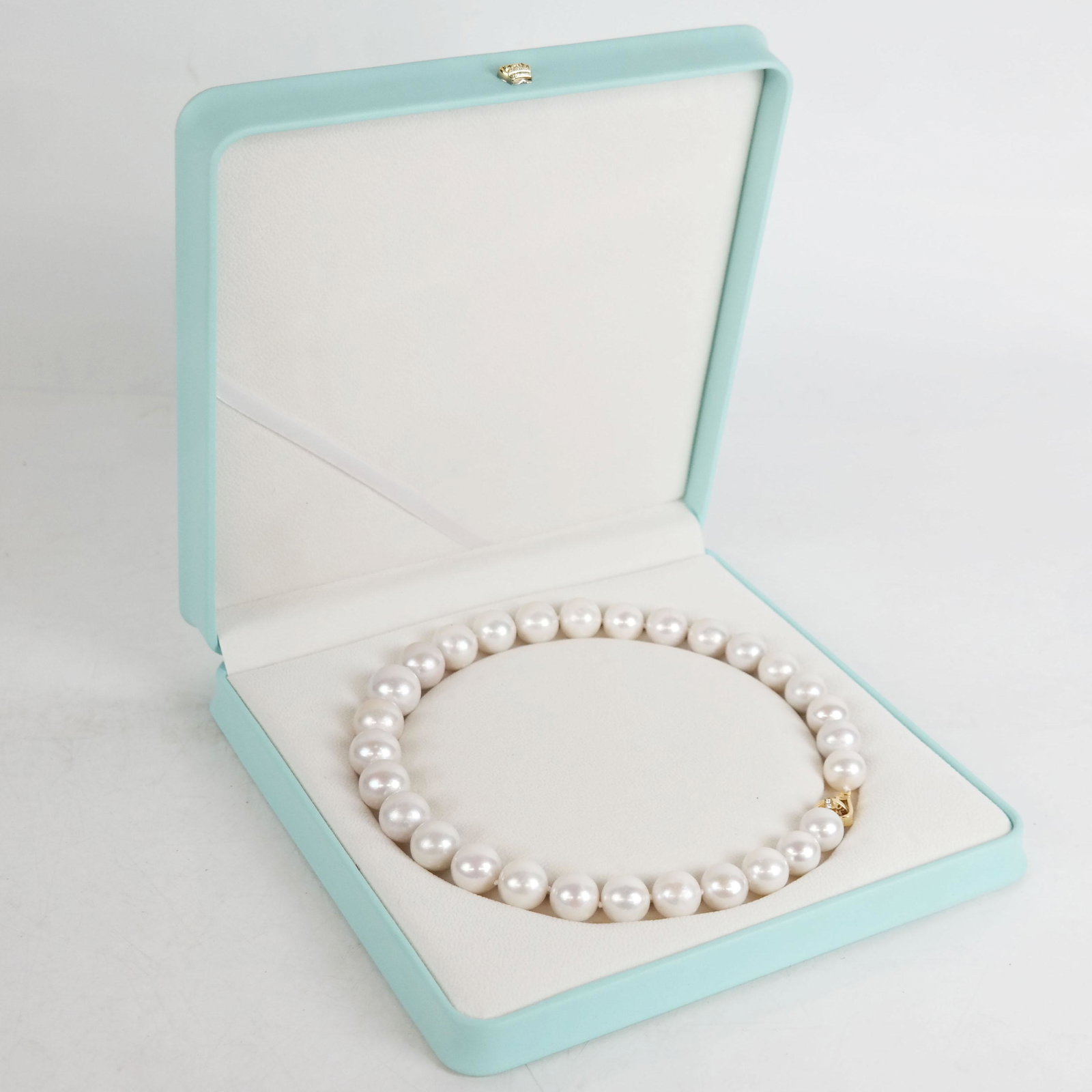 South Sea Pearl Necklace with 18K & Diamond Clasp: Large 13-17mm South Sea cultured pearl necklace with 18k gold and .24 carat diamond clasp; stamped 750. [17" L].