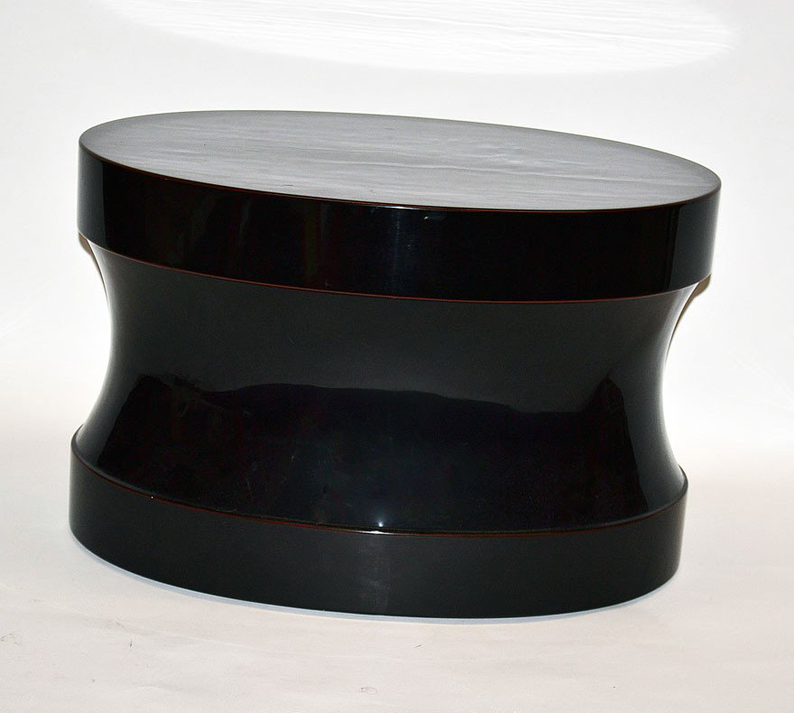 Holly Hunt "Filbuste" Pedestal: Modern black laquered oval and shaped pedestal by Holly Hunt, "Filbuste", model. 24" x 16.5" x 15.25" H.