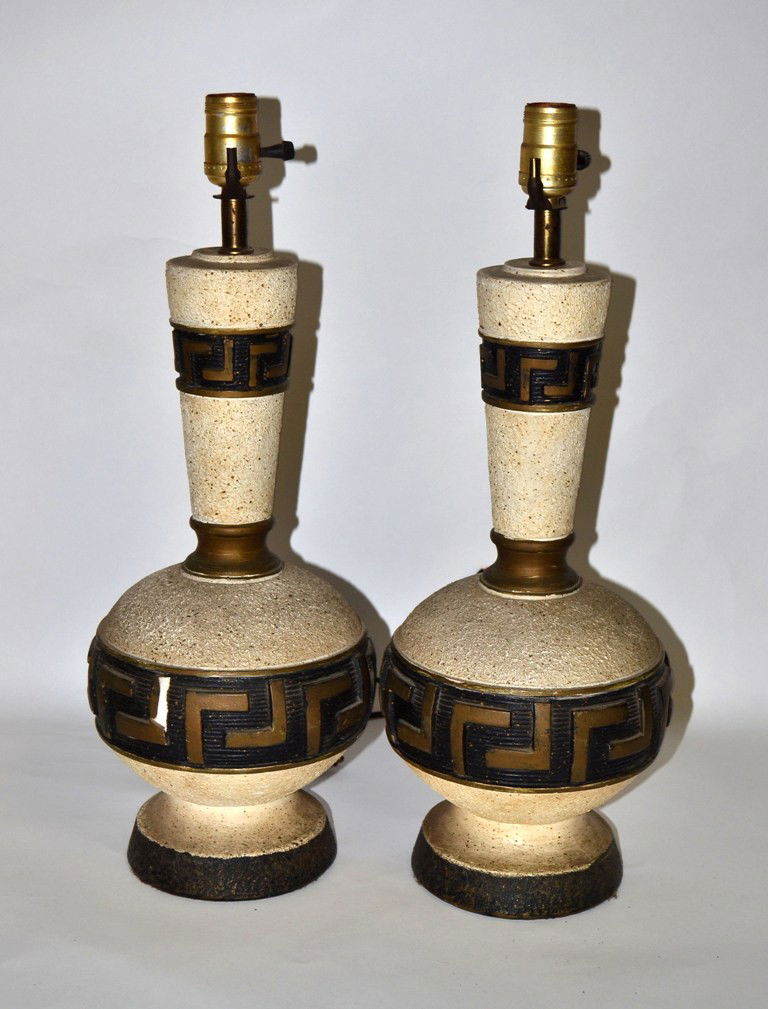Pair of Mid-Century Ceramic Vase-Form Table Lamps: Pair of mid-century modern ceramic vase-form table lamps. Each bears two wide bands with stylized green key motif in gold against an incised background. 8" dia.r x 20" H to socket. Both in vintage con