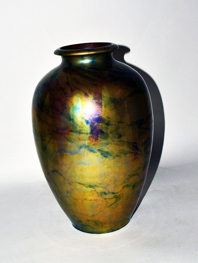Unique Zsolnay Eosin Art Porcelain Vase: Mysterious Eosin iridescent metallic glazed vase bearing original marks and numbers. 13" H.