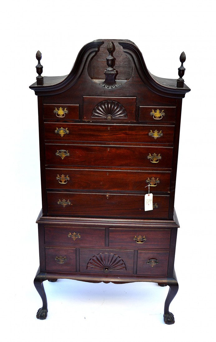 Charak Highboy: Two part mahogany highboy, by Charak, having a fan motif and flame finials with ball and claw feet. Good condition. 83" H x 40" L x 20" D.