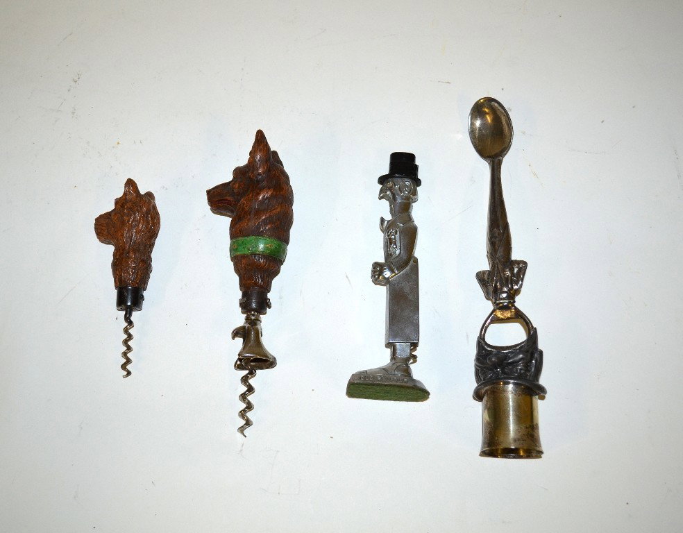 Group of Vintage Figural Corkscrews: Group of four vintage figural corkscrews. Comprises a composite terrier head, a composite german shepherd head, a two-faced silverplated mad hatter, and a stainless "Old Snifter."