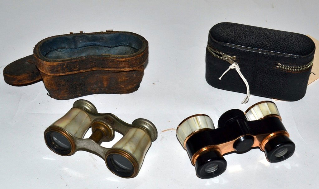 Two Pair, Vintage Opera Glasses: Two pair of vintage opera glasses with mother of pearl surrounds. Comprises a pair of Milo 3x zoom glasses with gold-tone fittings and a pair of Chevalier of Paris. Both in good vintage condition.