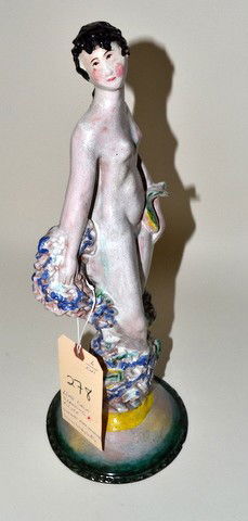 Lotte Calm Ceramic Figure of Aphrodite: The large glazed earthenware figure standing amidst waves. The base with impressed wiener werkstatte mark, made in Austria. H: 17"