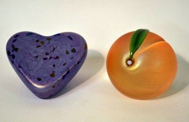 Two Contemporary Paperweights: One fruit form by Orient & Flume, the other heart form. Good condition.