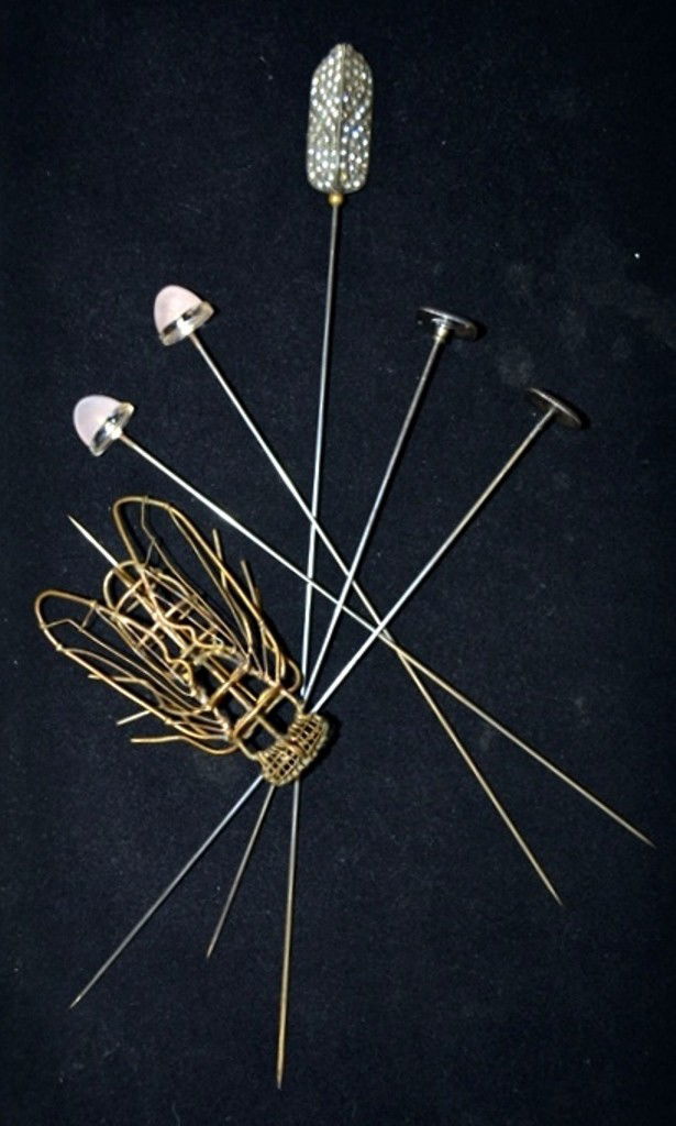 Six Antique Hat Pins: A fly-form pin, one rose quartz, one rock crystal, Niello & paste.