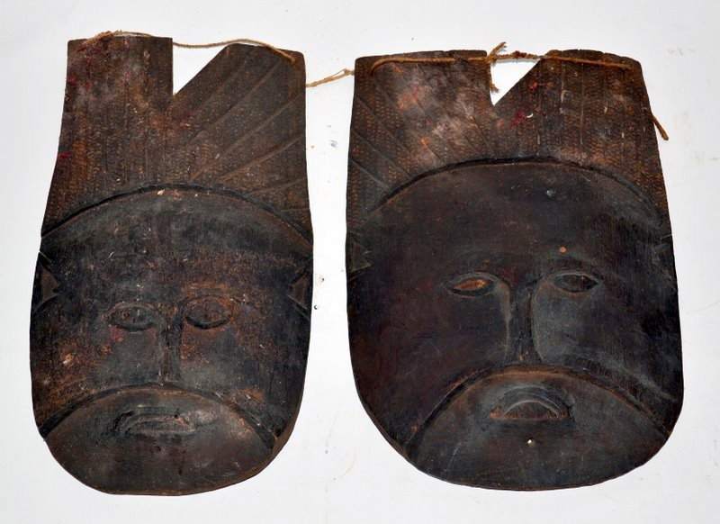 Pair of Antique Wood Carved Masks: Together with two figures.