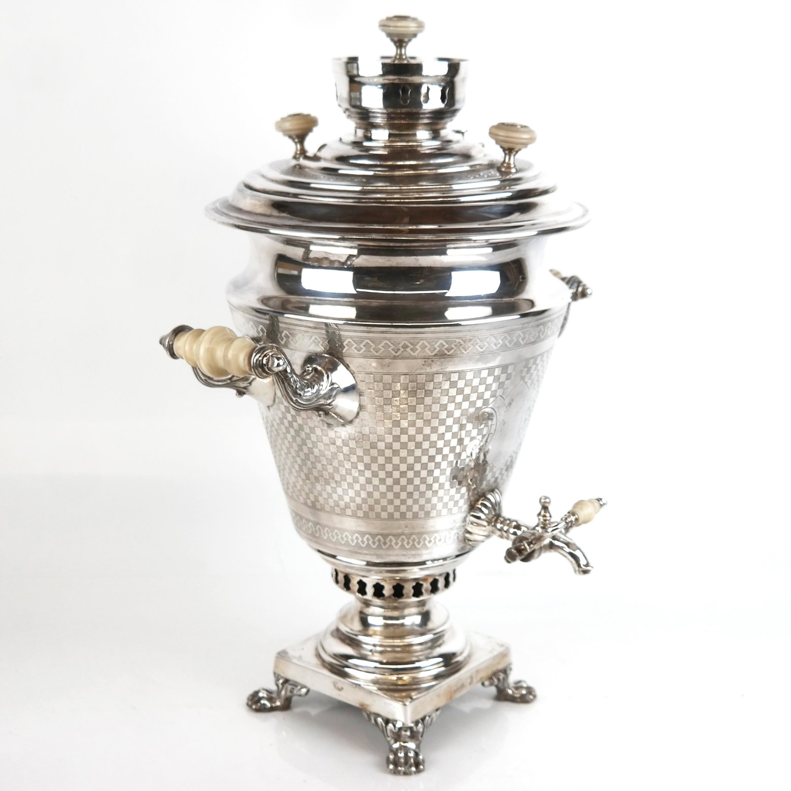 19th Century Russian Silver Samovar: Russian silver samovar of generous proportions, with fine checker pattern and neoclassical frieze bone handles, having four insulated bone mounts urn form with detachable covers, on square base with c