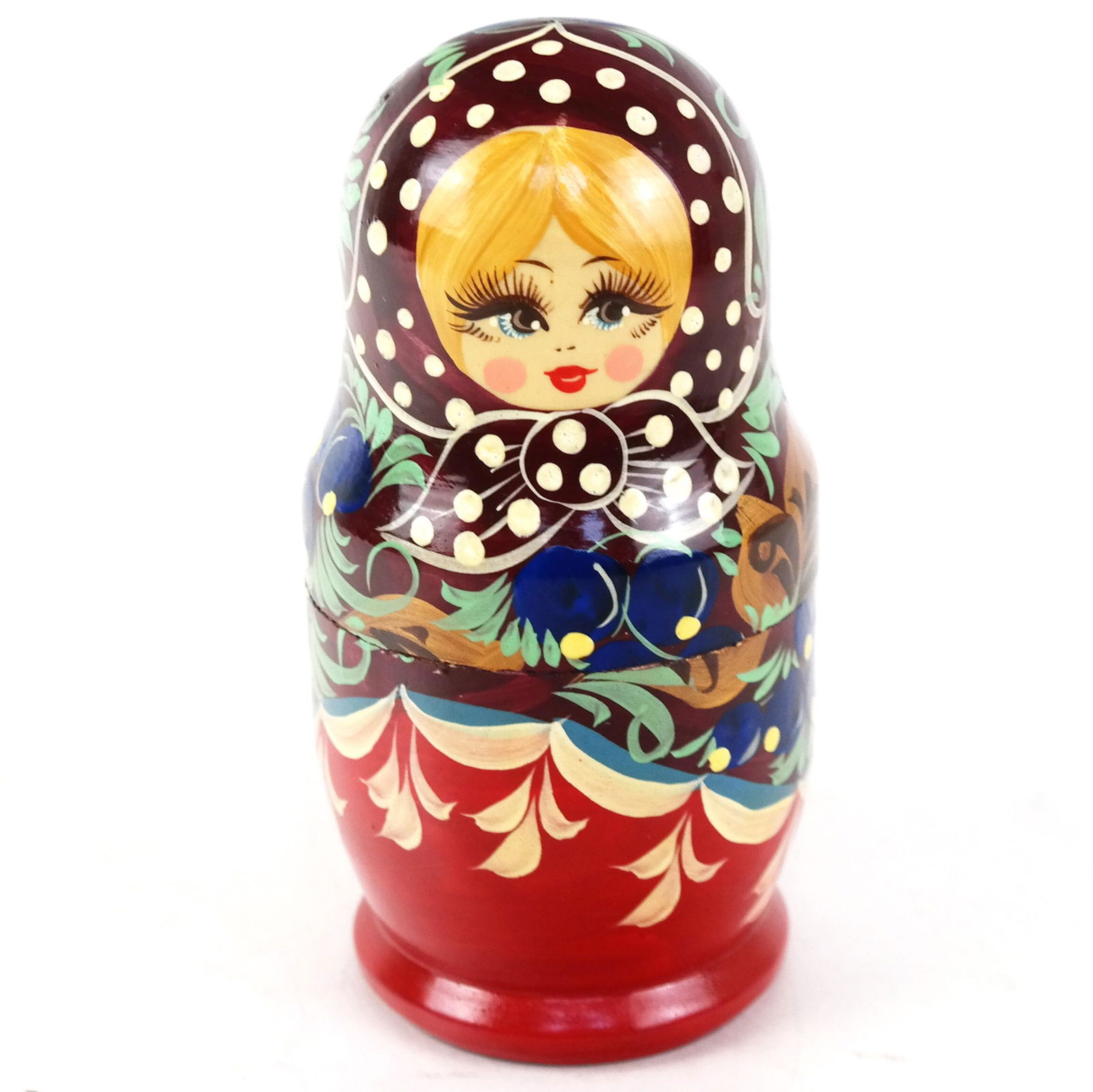 Vintage Eastern European Nesting Dolls: Vintage Eastern European nesting dolls, with four interior figures painted in traditional folk attire. [Largest: 6" H x 3" W]. In good condition.