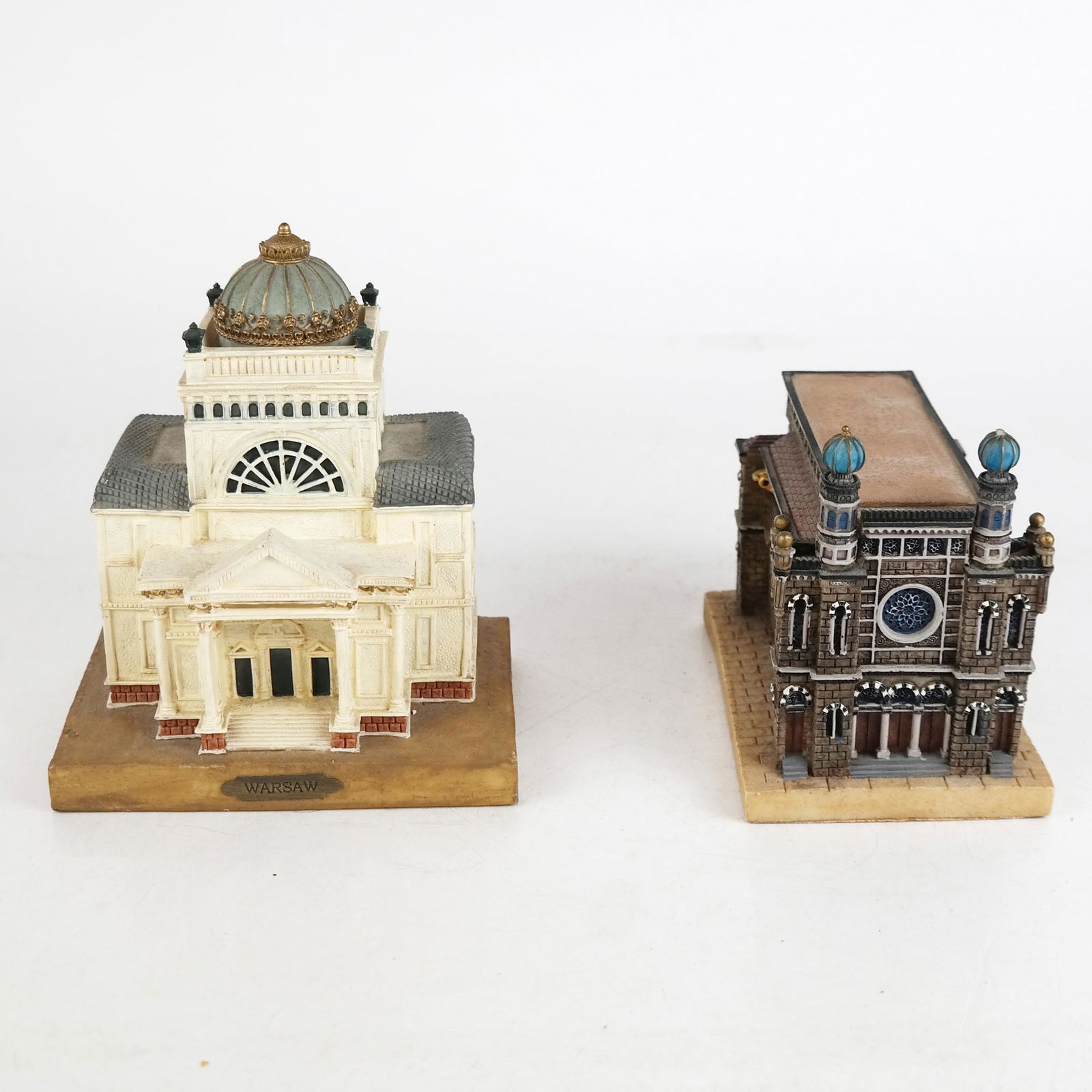 Two Smaller Examples of NYC & Warsaw: Two smaller examples of NYC and Warsaw, the NYC Central synagogue as a music box and casket, Warsaw just a model. [Largest: 5 3/4" H x 5" W x 3 1/2" D]. In good condition.