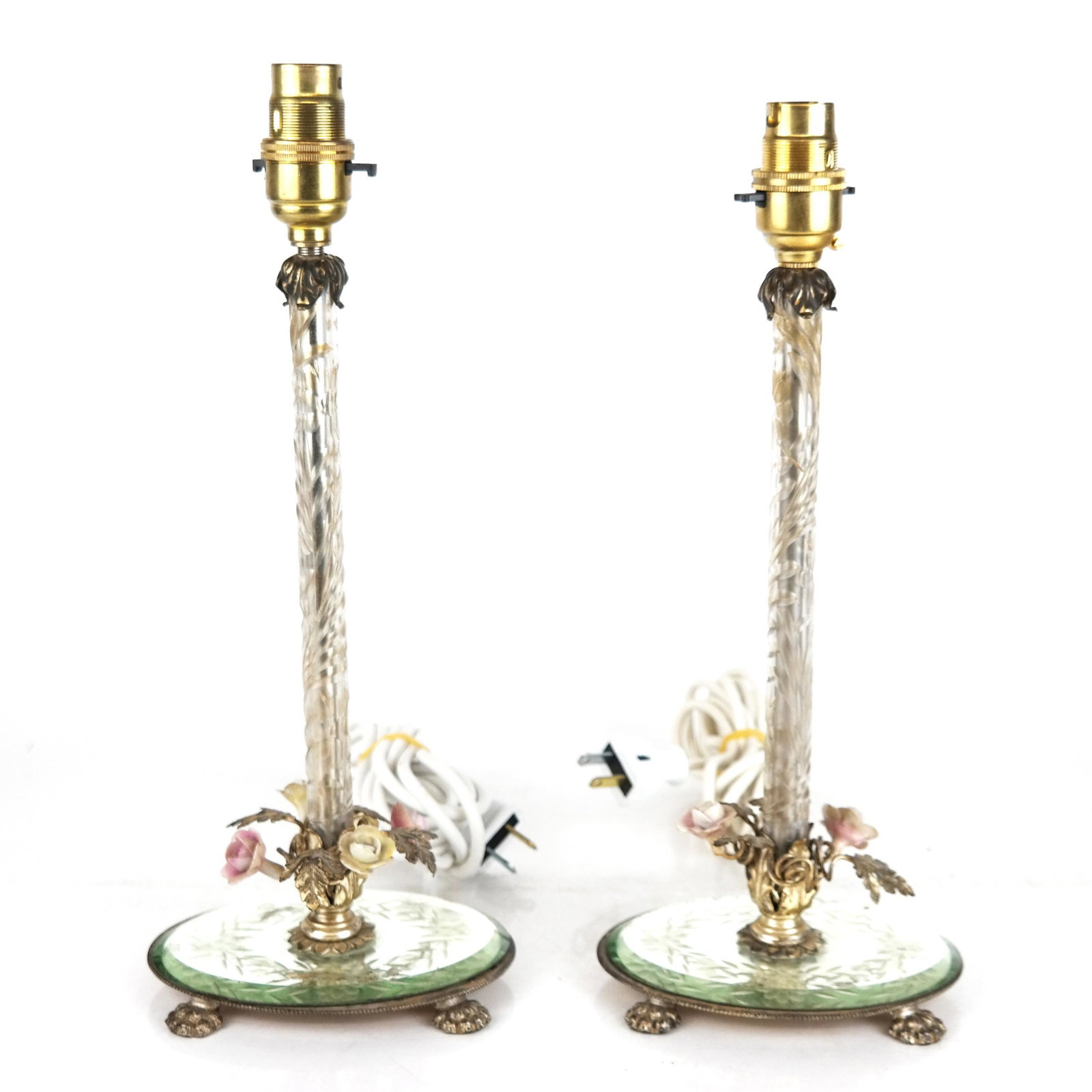 Pair of Victorian-Style Etched Glass Lamps: Pair of Victorian-style etched glass lamps with porcelain flowers and foliate motifs, on a mirrored base. [13 1/4" H x 5 1/2" W x 4" D]. A few areas of wear and losses.