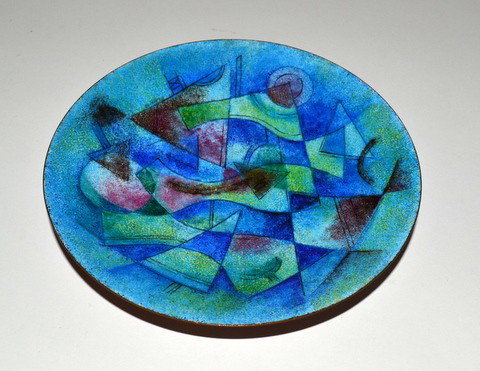 Karl Drerup Enameled Dish: Having an all-over cubist decoration in predominately blue tones. D: 6 7/8".