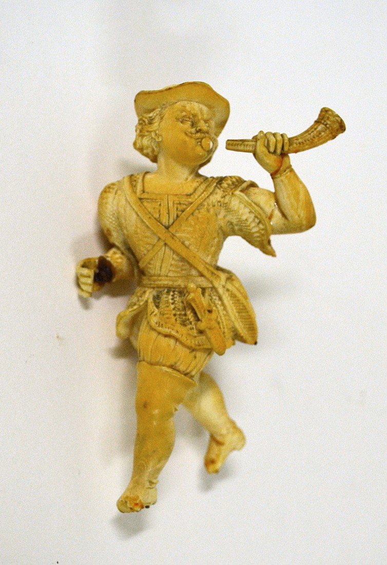 Ivory European Figure of a Hunter: A hunter blowing his horn. Arm repaired. Missing weapon. As is, no base.