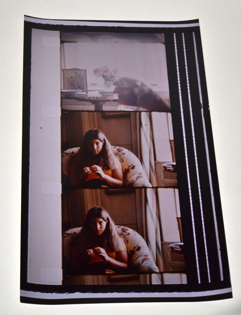 Jonas Mekas (1922- ) Signed Folio Size Film Still: Jonas Mekas (Lithuanian/American, 1922- ) Folio size film still composed of three frames, two depicting young Caroline Kennedy seated beside a window. Signed at bottom right, "Jonas Mekas" in silver t