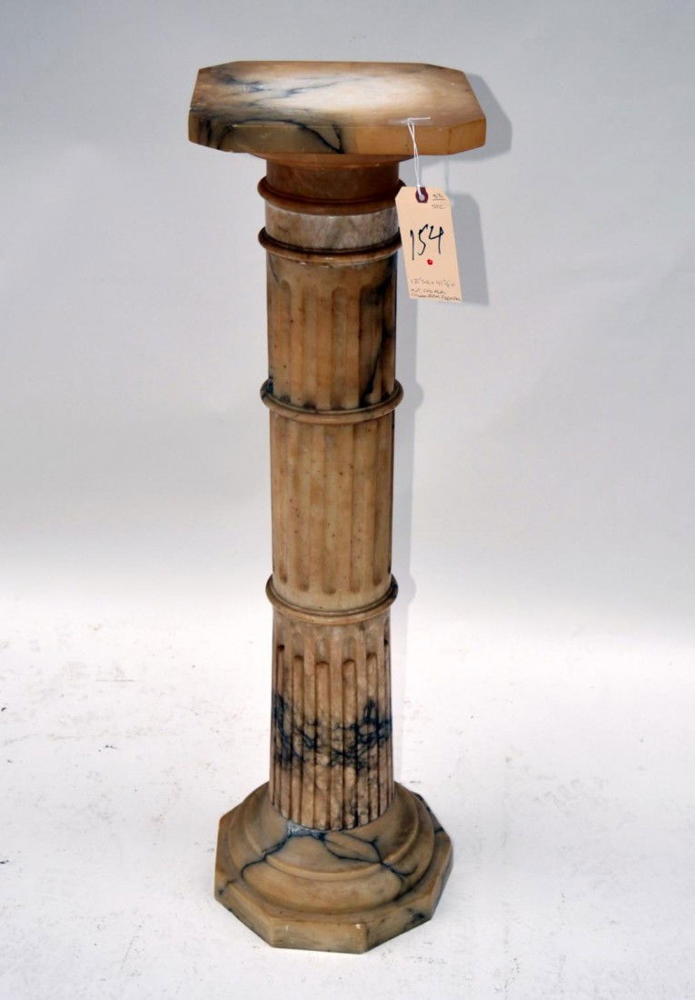 Alabaster Pedestal: in Classical form, having reeded columns, on an octagon plinth. 42"h x 12" x 12"