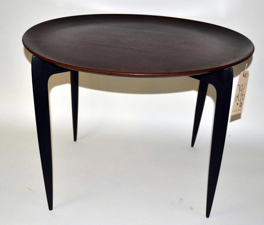 Mid-Century Danish Tray Top Table: Circular molded removable wood top on collapsible ebonized base. Diameter 23.5", Height 17"
