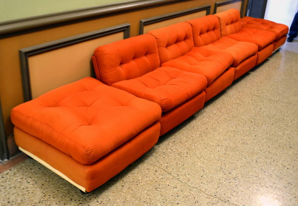 Six Piece Mario Bellini "Amanta" Sectional Sofa: Comprising four lounge seat units and two ottomans. Burnt Orange Microsuede upholstery 31.25"x30.75"x23.5"h Seat Height: 17.5" Some fading and discoloring, otherwise good