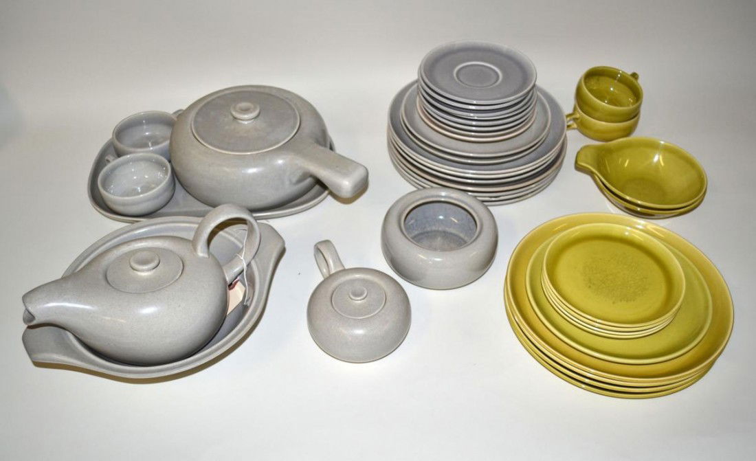 Russel Wright Ceramic Group (43 Pieces): Group of Russel Wright gray glazed ceramic serving articles comprising plates, cups and saucers, casserole, covered pot, platter, etc. Accompanied by a similar smaller wright group with chartreuse gla