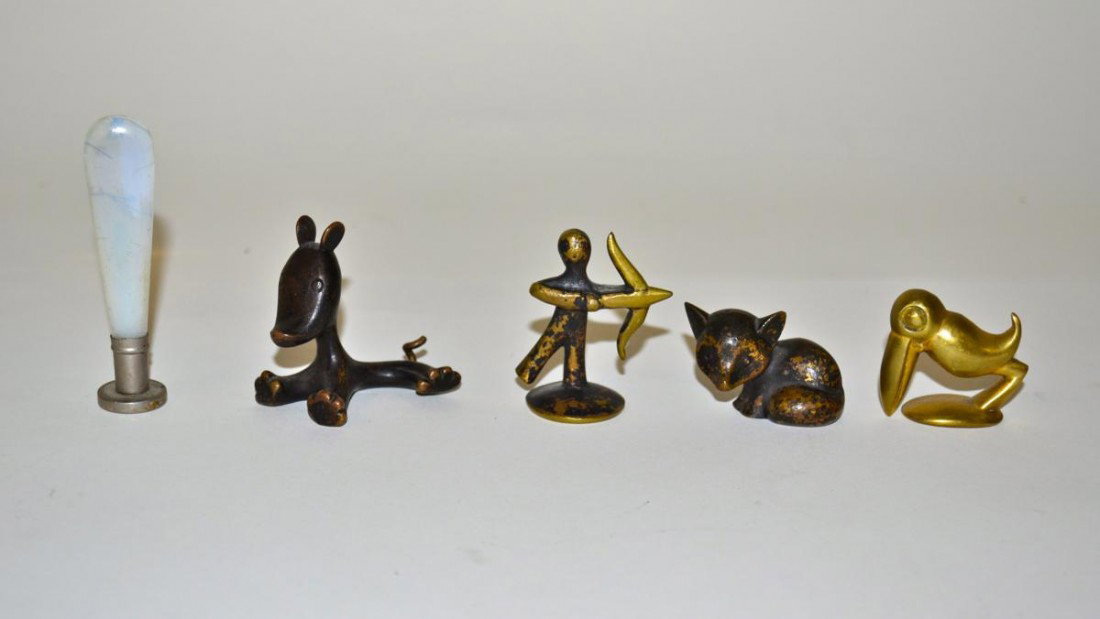 Two Hagenauer Bronze Animals & Others: Comprises a Hagenauerfox and pelican, accompanied by two Vienna bronze figures comprising a dog and an archer. With a wax seal stamp bearing the initials "P.R." and an opaline glass handle. 2.75" H.