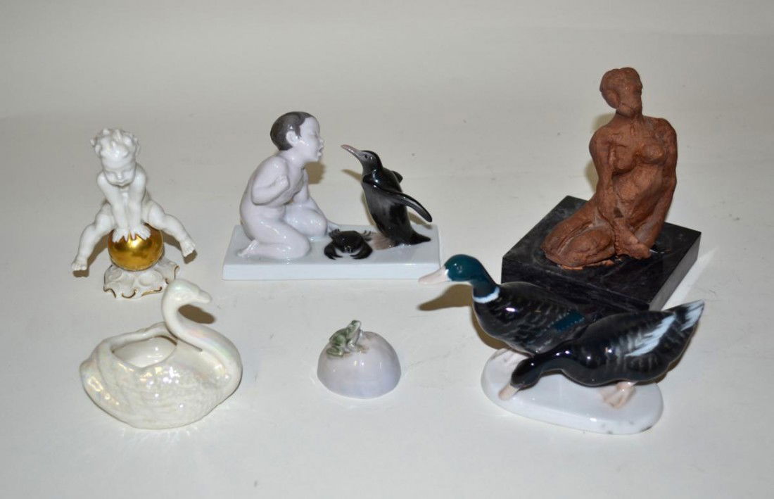 Figural Porcelain & Earthenware Group (6 Pieces): Comprises a Rosenthal group of a boy and a penguin. Accompanied by ducks, Putti, frong, and seated woman. Tallest: 6" H.