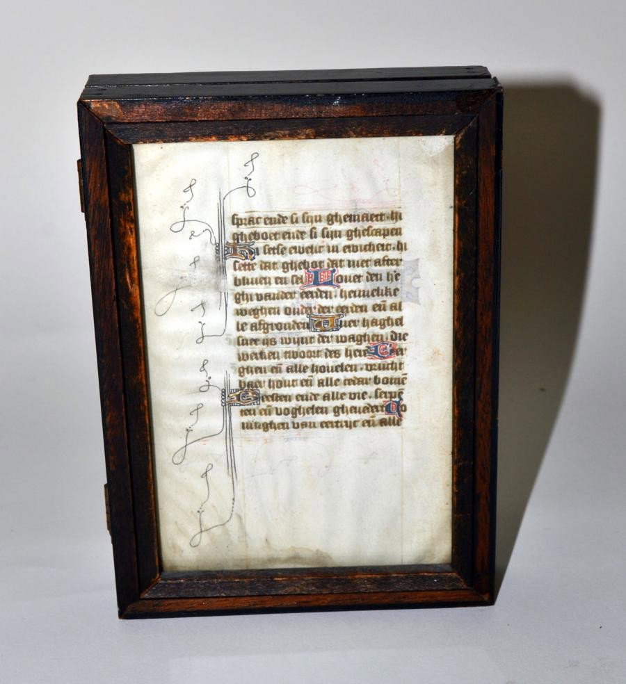 Antique French Miniature Illuminated Manuscript: Two framed antique French miniature illuminated manuscript leaves comprising four pages of text with many lines beginning "Benedict." Text 2.5" x 1.75" on leaves, 4.75" x 3.25". Both frames hinged tog