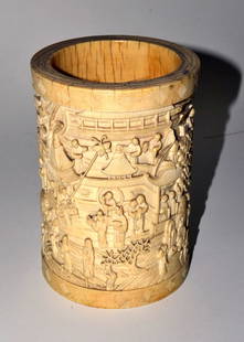 Ivory Relief Vessel: An antique ivory vessel, all around relief work of Chinese scenes. Good condition. 6.5" H.