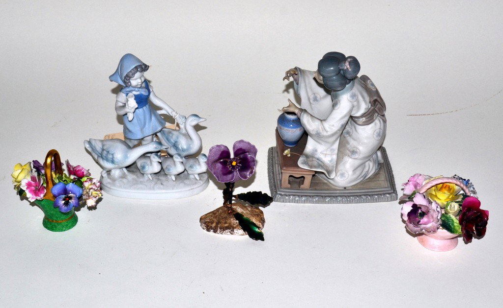 Lladro Japanese Figure and Others: Lladro Japanese woman, missing four fingers and floral elements. 7.5" H. With a Bavarian porcelain of a young girl among geese, accompanied by three small porcelain and enamel floral groups.