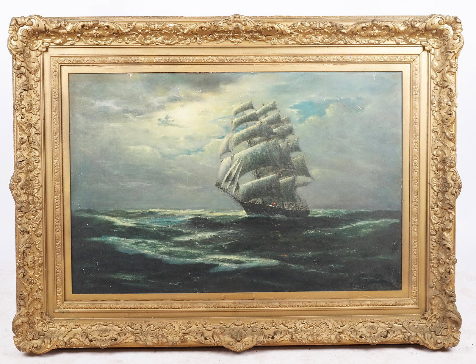 Clipper Ship in Stormy Sea - 19th C. Oil on Canvas: Late 19th century oil painting of a clipper ship at full sail in a stormy sea; signed illegibly lower right. [Art: 24" H x 36" W; Frame: 35" H x 47" W]. Surface scratches on canvas, gilt frame with ch