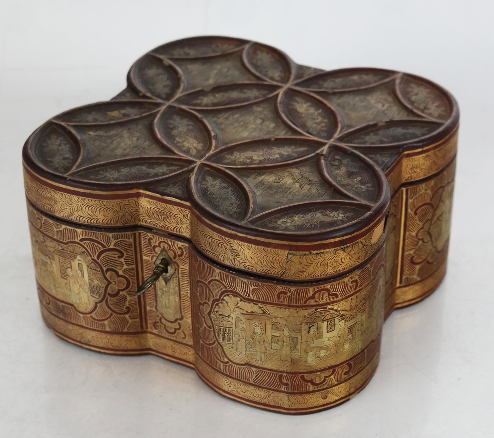 Chinese Lacquer Tea Caddy with Lock & Key: Chinese lacquer tea caddy with interlocking circles design, with internal pewter container with bone handle, engraved top surface, lock and key. [4 1/4" H x 8" W x 8" D]. Interior in good condition. E