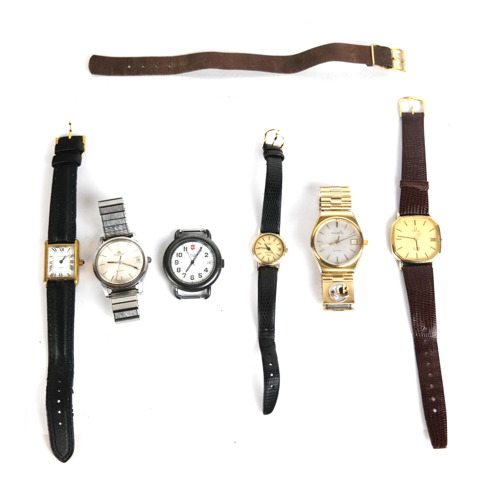 Six Vintage Watches: Six vintage watches, including Bucherer, automatic date, Accutron quartz, Omega De Ville quartz, Swiss Army, Longines quartz with rectangular face, and a Longines quartz with 10k gold filled round fac