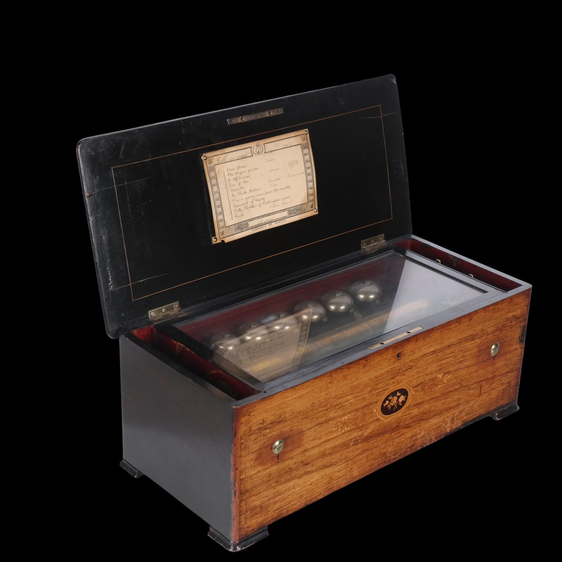 Antique Swiss Cylindrical Music Box: Antique Swiss cylindrical music box in the style of Nicole Freres, with 10 tunes and wood inlaid case; numbered 10617. [10" H x 25" W x 11 1/2" D]. In good condition.